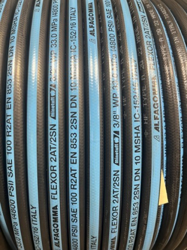 A coil of Alfagomma two-wire hydraulic hose on the rack at J Supply